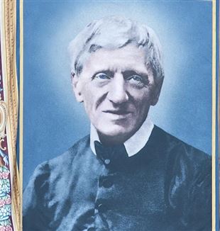 Het wandtapijt met het gezicht van Newman op de gevel van de Sint-Pietersbasiliek op de dag van zijn heiligverklaring, 10 oktober 2019 (©Catholic Press Photo)